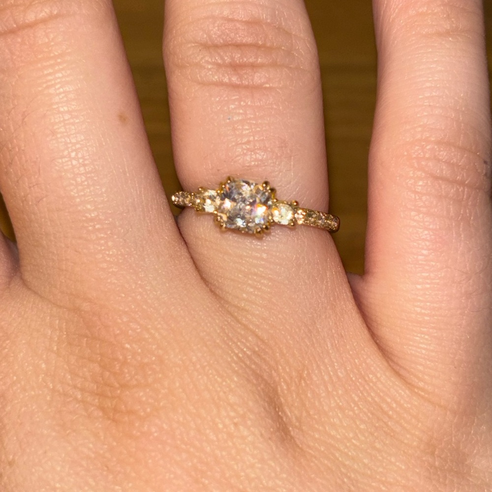 Radiant Gold Ring with Sparkling Stone